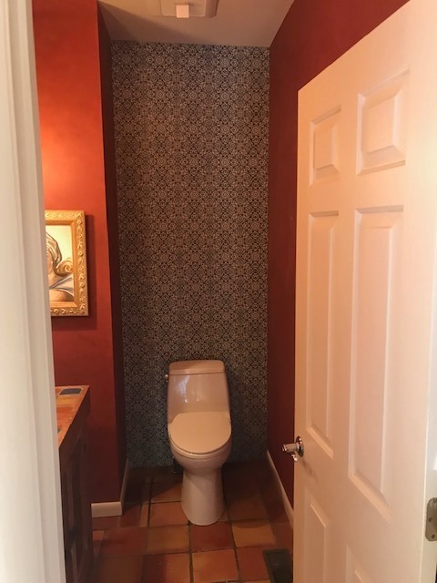 Bathroom with tile wall