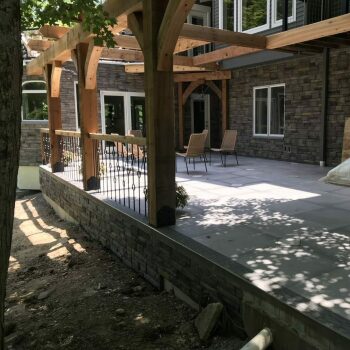 patio with gray tile and chairs