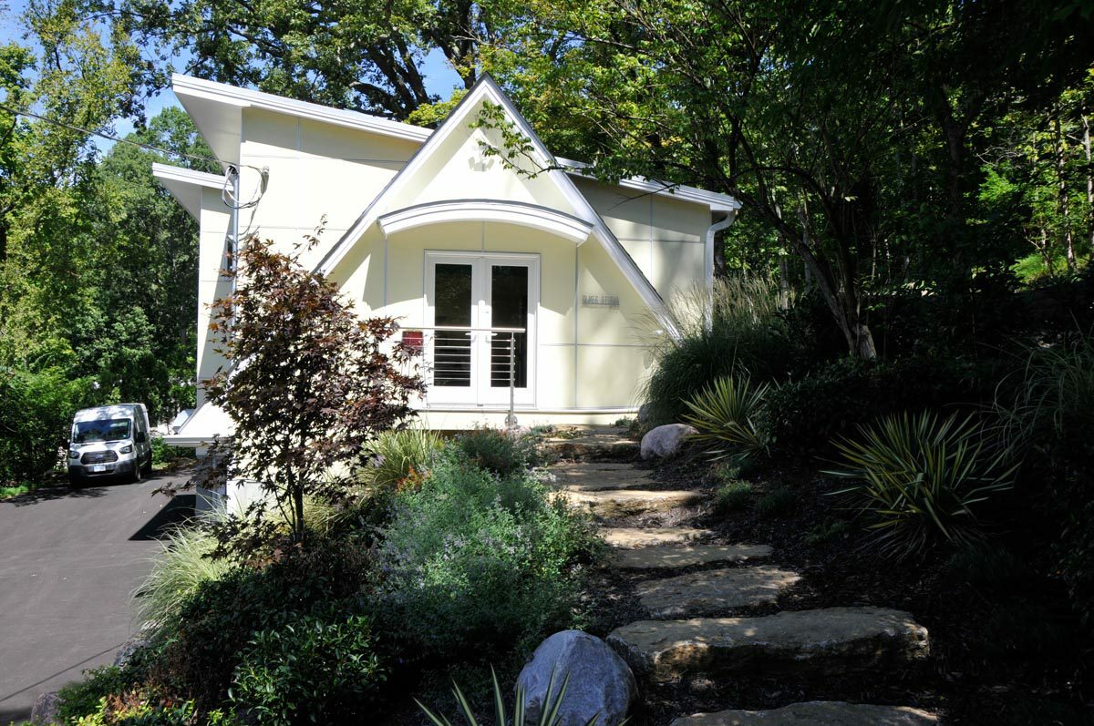 art studio entrance with landscaping